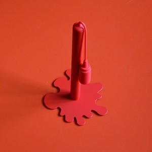 dérouleur de sopalin en forme de tache de ketchup, en fer et silicone